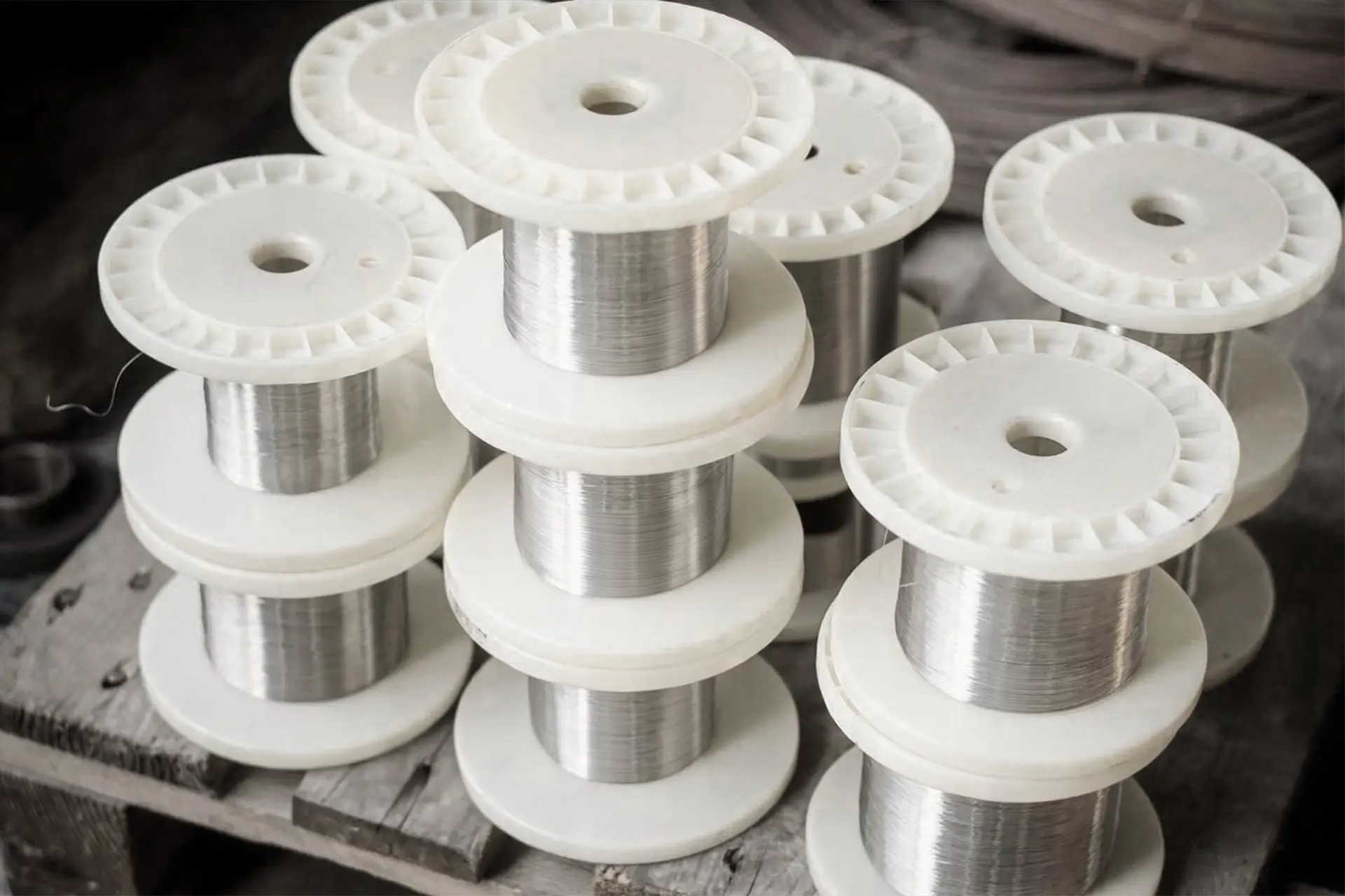 nickel alloy fine wire by Arialloy assorted wire spools on bench