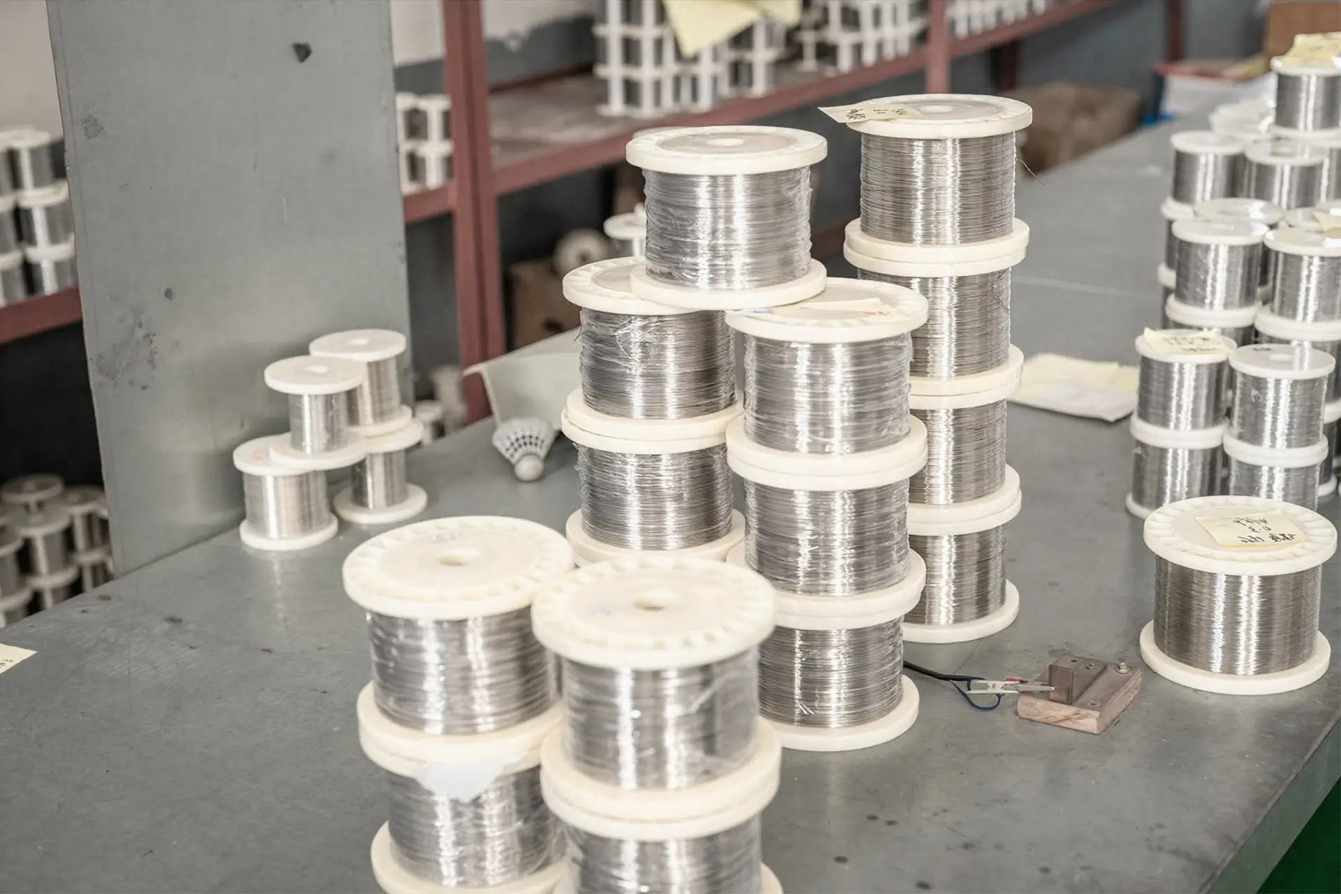 nickel alloy spooled wire manufacturing by Arialloy tall wire spool display